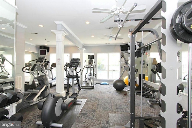 exercise room with carpet flooring, ornamental molding, ceiling fan, and ornate columns