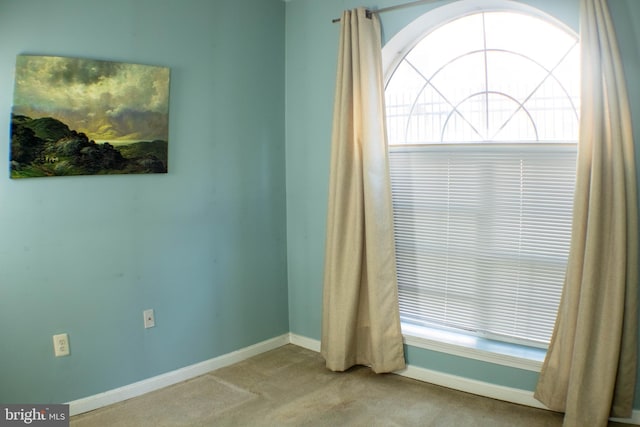 view of carpeted spare room