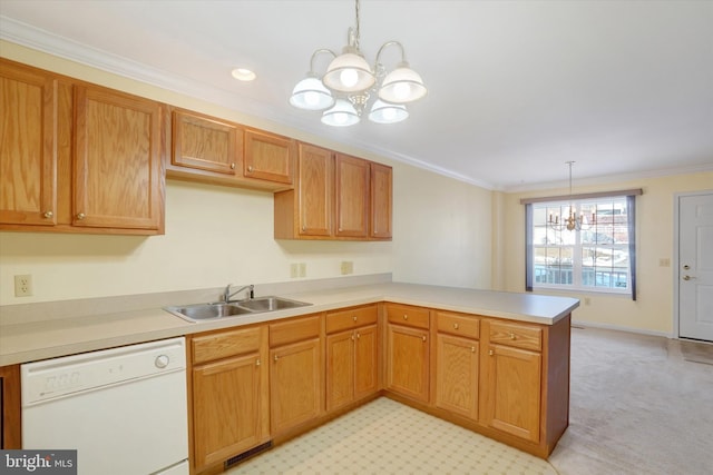 kitchen with sink, dishwasher, an inviting chandelier, decorative light fixtures, and kitchen peninsula