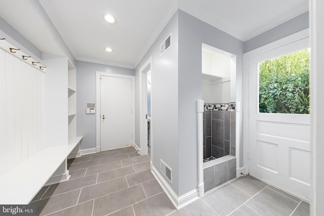 mudroom featuring recessed lighting, tile patterned flooring, visible vents, and ornamental molding