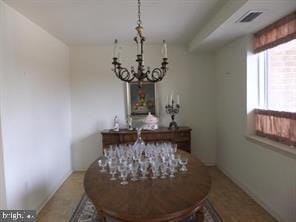 dining area featuring a chandelier