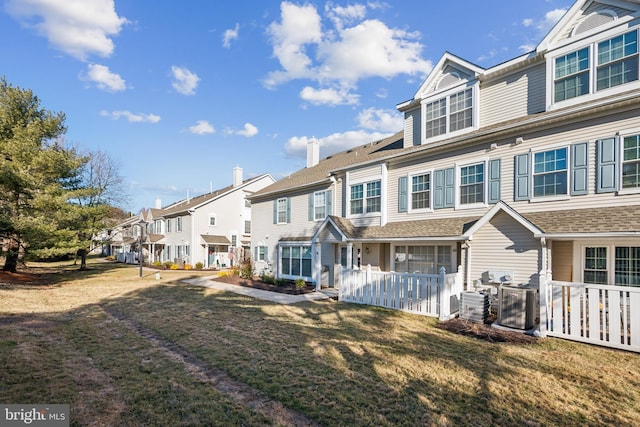 view of front of home with a front lawn