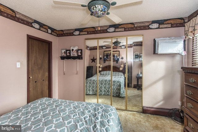 carpeted bedroom with a textured ceiling