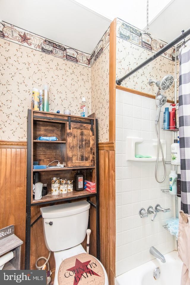 bathroom with toilet and shower / bathtub combination with curtain