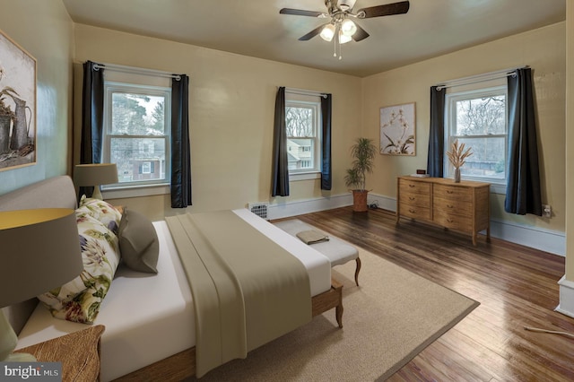 bedroom featuring light hardwood / wood-style flooring and ceiling fan