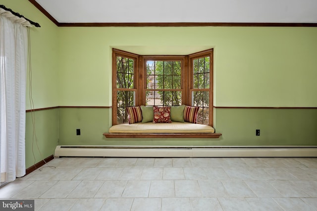 empty room featuring ornamental molding and a baseboard heating unit