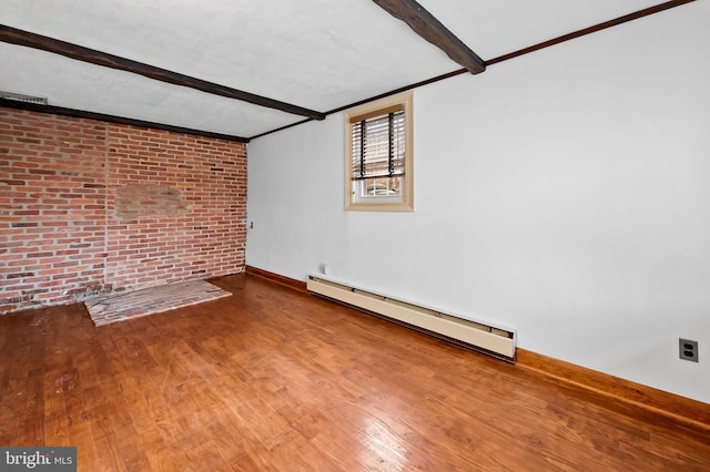 unfurnished living room featuring brick wall, a baseboard heating unit, hardwood / wood-style floors, and beam ceiling