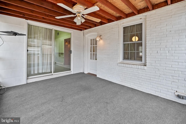 view of patio / terrace featuring ceiling fan