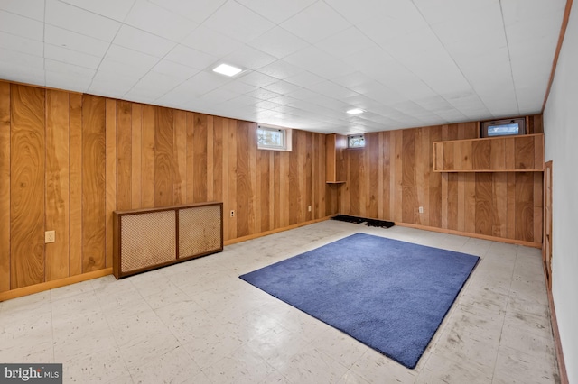 workout area with wooden walls