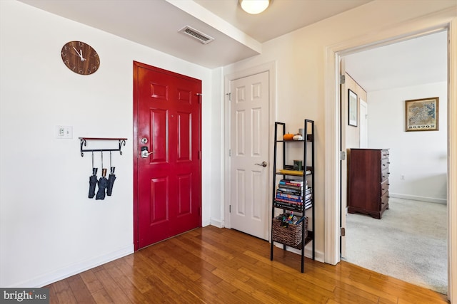 foyer featuring hardwood / wood-style floors