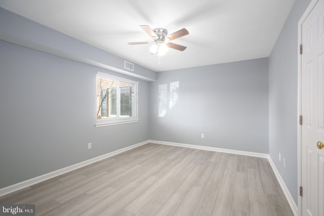 unfurnished room with ceiling fan and light hardwood / wood-style flooring