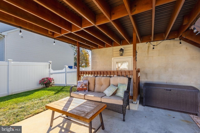 view of patio featuring an outdoor living space and radiator