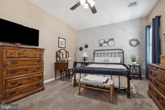 bedroom with light colored carpet and ceiling fan