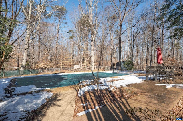 view of snow covered pool