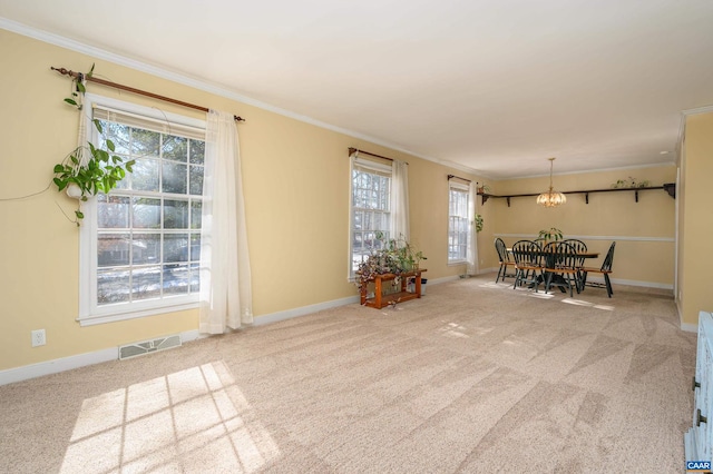 interior space with crown molding and carpet flooring