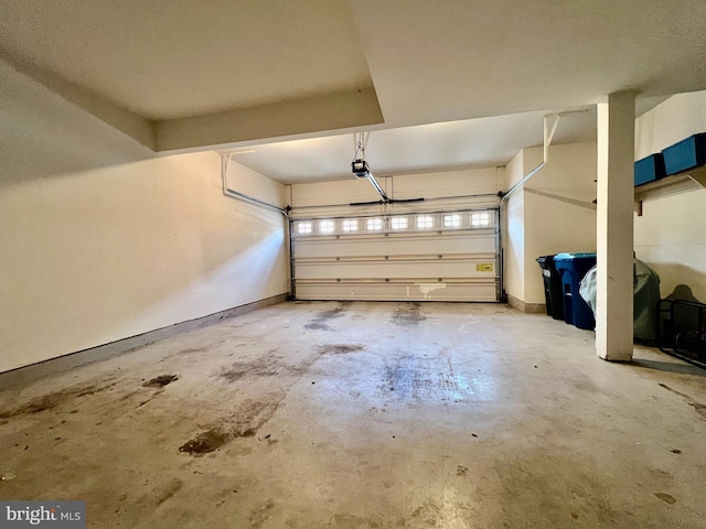 garage featuring a garage door opener