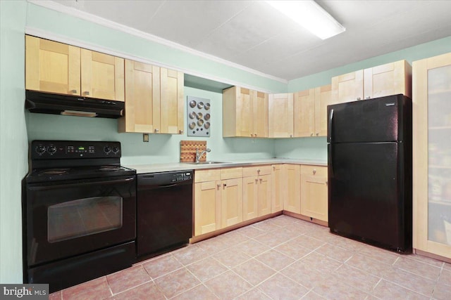 kitchen featuring light brown cabinetry, sink, ornamental molding, light tile patterned floors, and black appliances