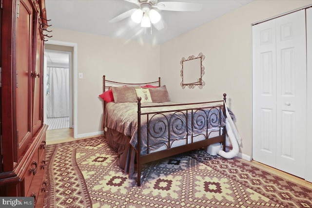 bedroom featuring a closet and ceiling fan