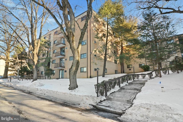 view of snow covered building