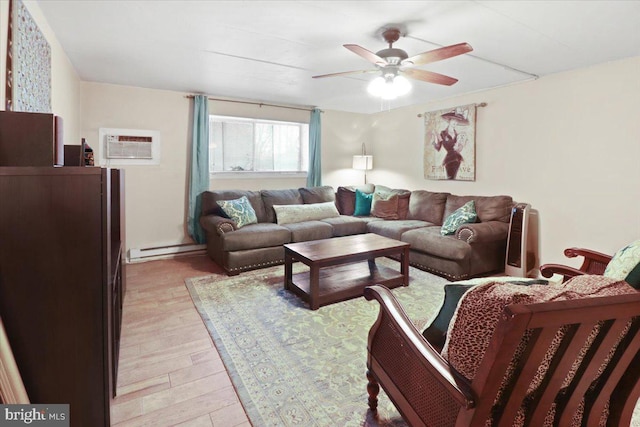 living room with a baseboard heating unit, light hardwood / wood-style flooring, a wall unit AC, and ceiling fan