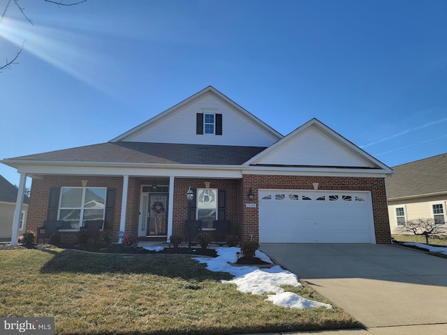 view of front of property featuring a garage and a front yard