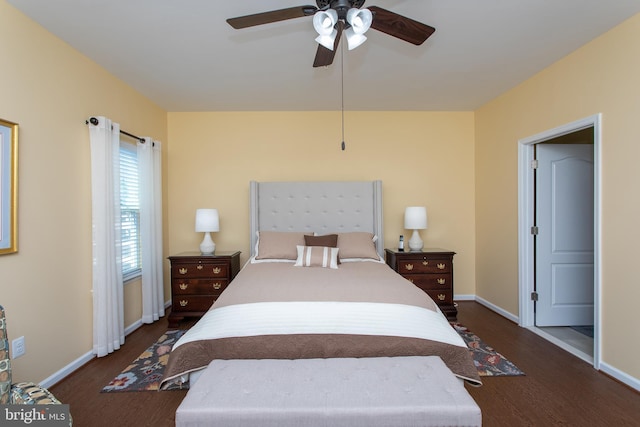 bedroom featuring dark wood-type flooring and ceiling fan