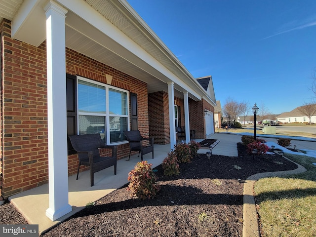 view of property exterior featuring covered porch