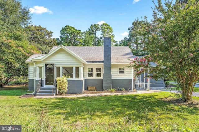 view of front of house with a front yard