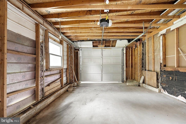 garage featuring a garage door opener