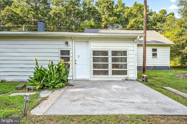 exterior space with a lawn