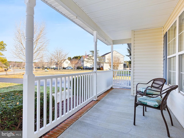 balcony featuring a porch