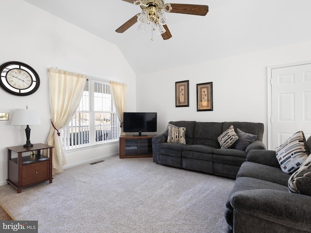 living room featuring ceiling fan, light colored carpet, and vaulted ceiling