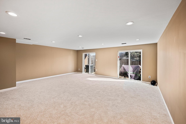 unfurnished room with carpet flooring