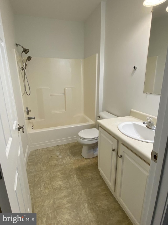 full bathroom featuring vanity, toilet, and bathing tub / shower combination