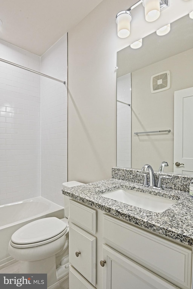 full bath featuring toilet, shower / washtub combination, visible vents, and vanity