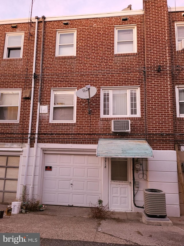 view of property featuring a garage