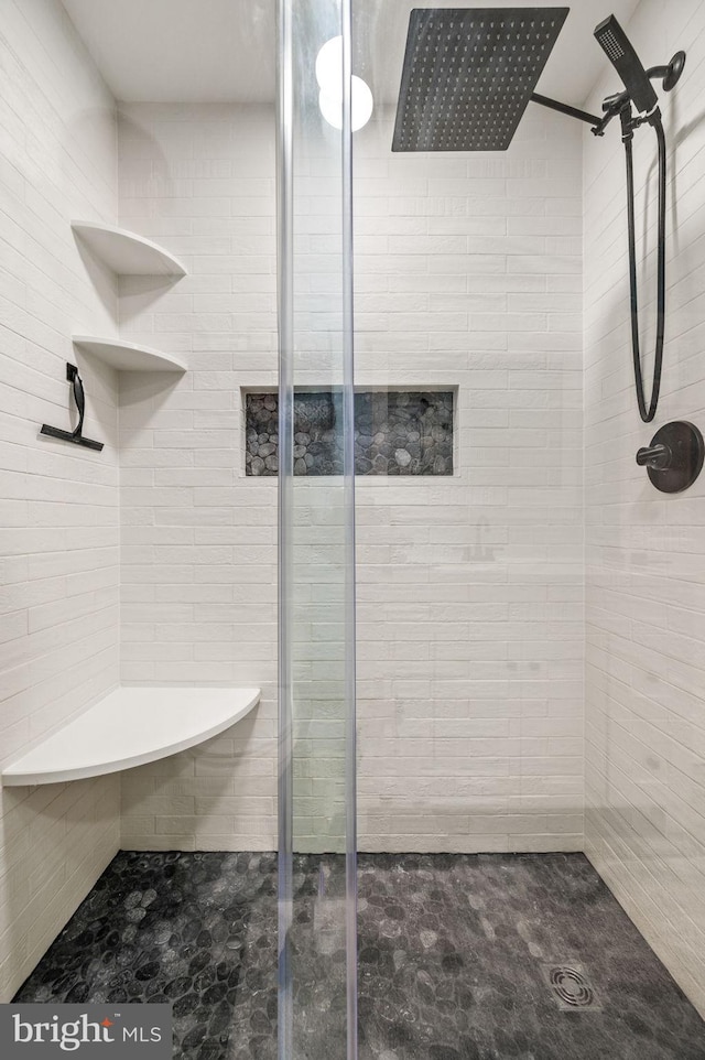 bathroom featuring walk in shower