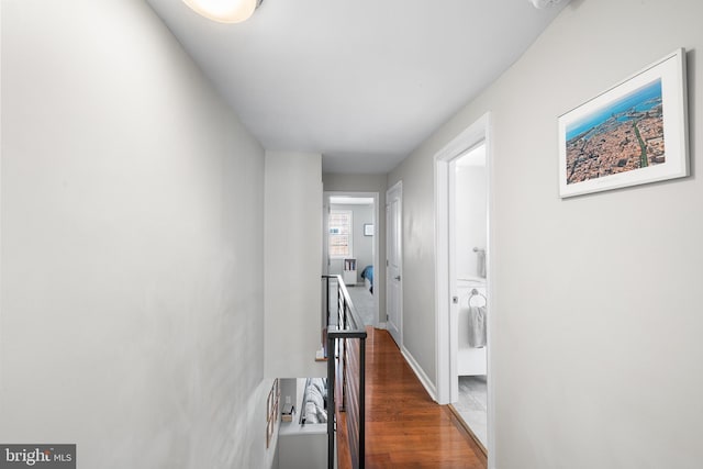 hall with dark hardwood / wood-style floors