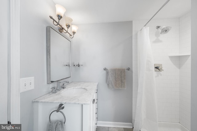 bathroom with vanity and curtained shower