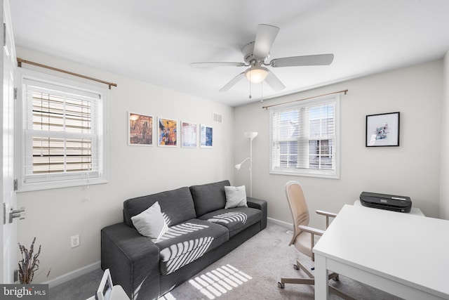 office with plenty of natural light, carpet floors, and ceiling fan