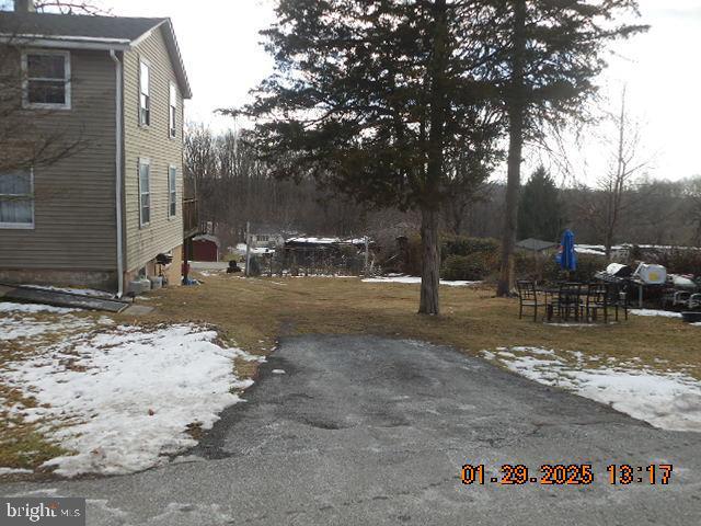 view of snowy yard