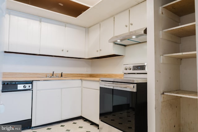 kitchen with stainless steel electric stove, dishwasher, sink, and white cabinets