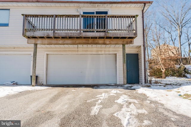 view of snow covered garage