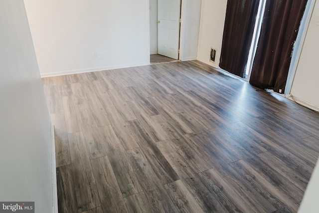 unfurnished bedroom featuring hardwood / wood-style floors