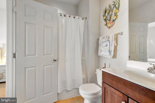 full bathroom featuring vanity, toilet, and shower / tub combo