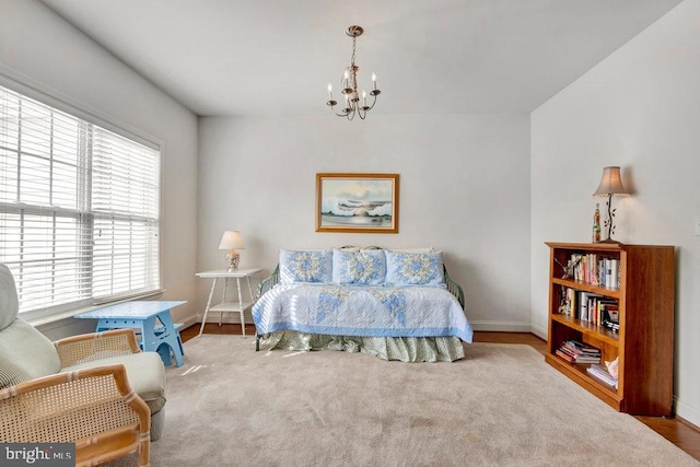 bedroom featuring a chandelier