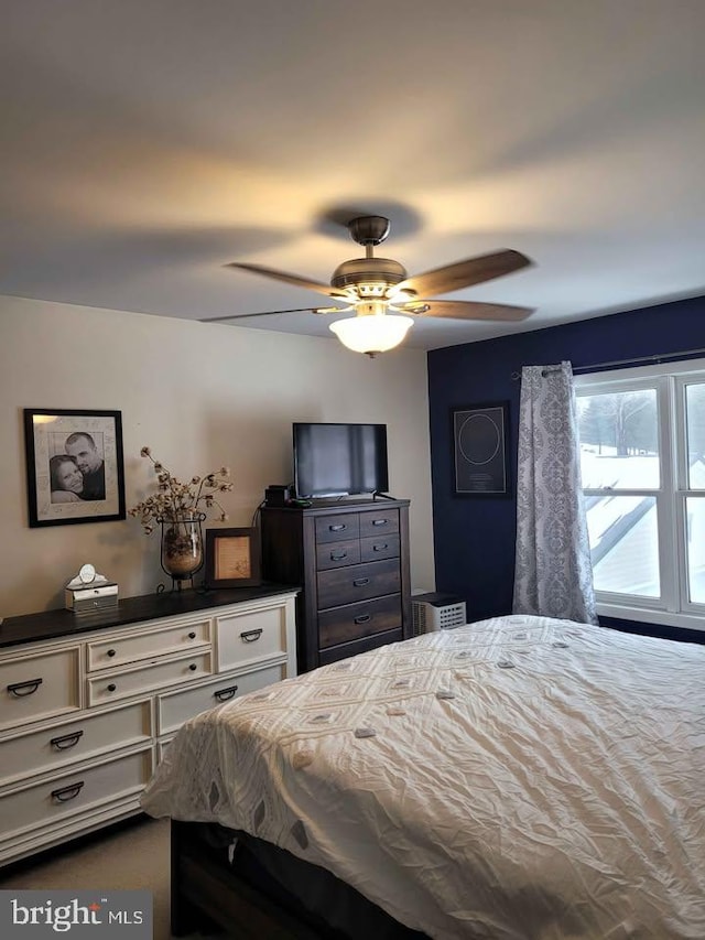 bedroom featuring ceiling fan