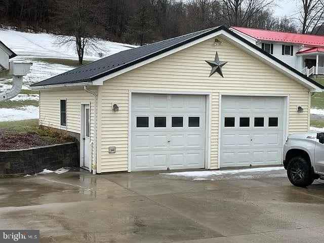 view of snow covered garage