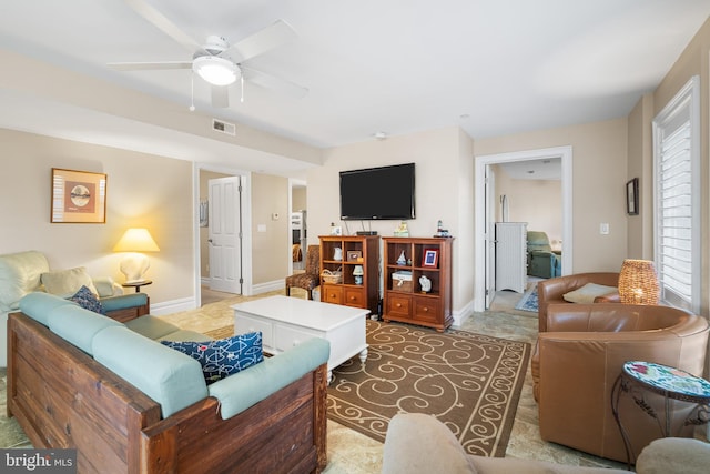 living room featuring ceiling fan