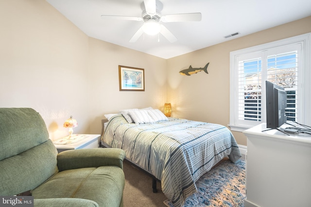 carpeted bedroom with ceiling fan